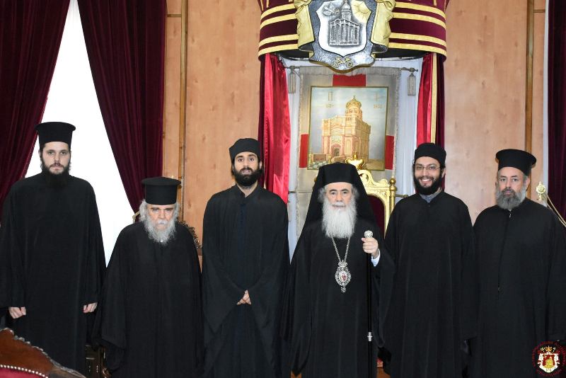 Patriarch of Jerusalem blesses monastic cassocks of two young novices